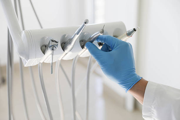 Professional Tooth Extraction technician working in West Lake Hills, TX
